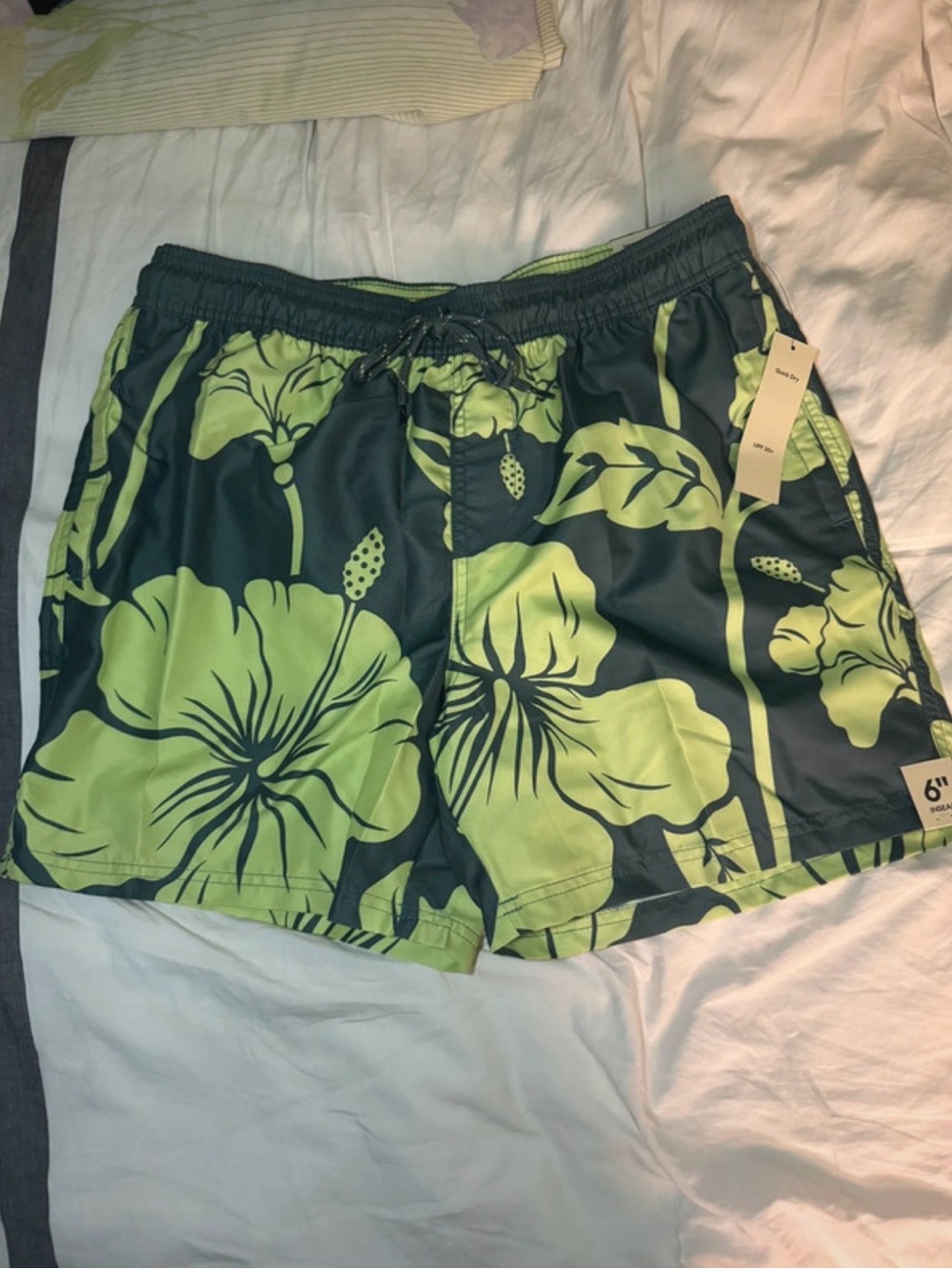 No Boundaries Light Green Swim Shorts with Navy Stitching